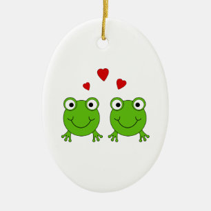 Two green frogs with red hearts. ceramic ornament
