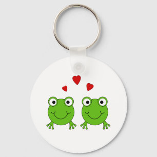Two green frogs with red hearts. keychain
