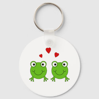 Two green frogs with red hearts. keychain