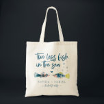 Two Less Fish In The Sea Wedding Favour Tote Bag<br><div class="desc">This design features a nautical pair of watercolor fish and a modern script font. Click the "Customize it further" button to get started with your layout - even change the colour of the wording! See the entire collection for more matching items!</div>