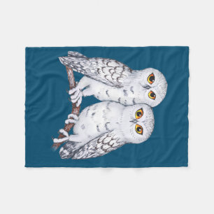 Two lovely snowy owls fleece blanket
