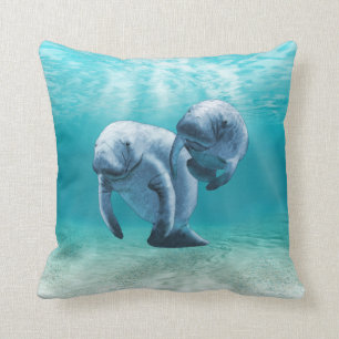 Two Manatees Swimming Throw Pillow
