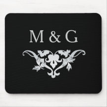 Two Monograms with Scrollwork and Leaves A33