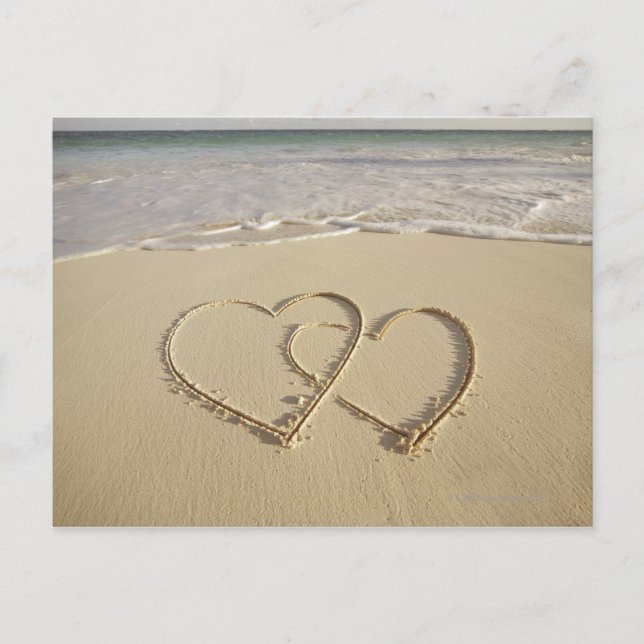 Two overlying hearts drawn on the beach postcard (Front)
