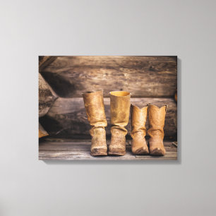 Two Pair Worn Cowboy Boots in Cabin Canvas Print
