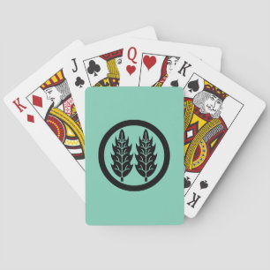 Two parallel holly leaves in circle playing cards