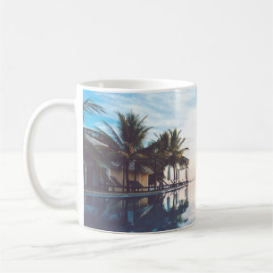 Two person standing beside swimming pool coffee mug