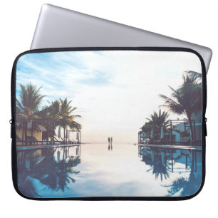 Two person standing beside swimming pool laptop sleeve
