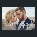 Two Photo with Modern Script | Engagement Party Invitation<br><div class="desc">This whimsical and elegant engagement party invitation features two of your favourite personal photos,  with trendy white handwritten script that says "we're engaged" on the front,  and all of your party information on the back. A simple and modern look that will fit perfectly with your style!</div>