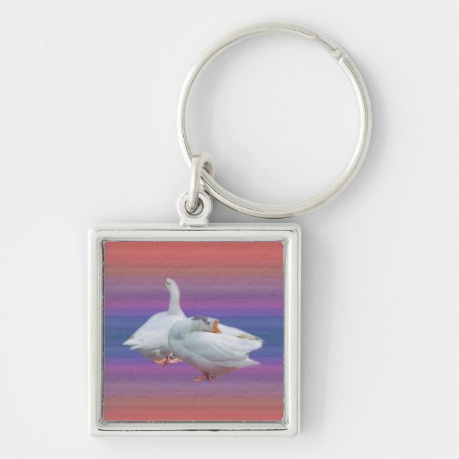 two playful white geese keychain (Front)