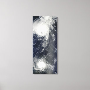 Two powerful storms span the Atlantic Ocean Canvas Print