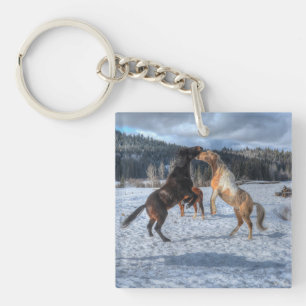 Two Ranch Horses Playfighting in Winter Snow IV Keychain