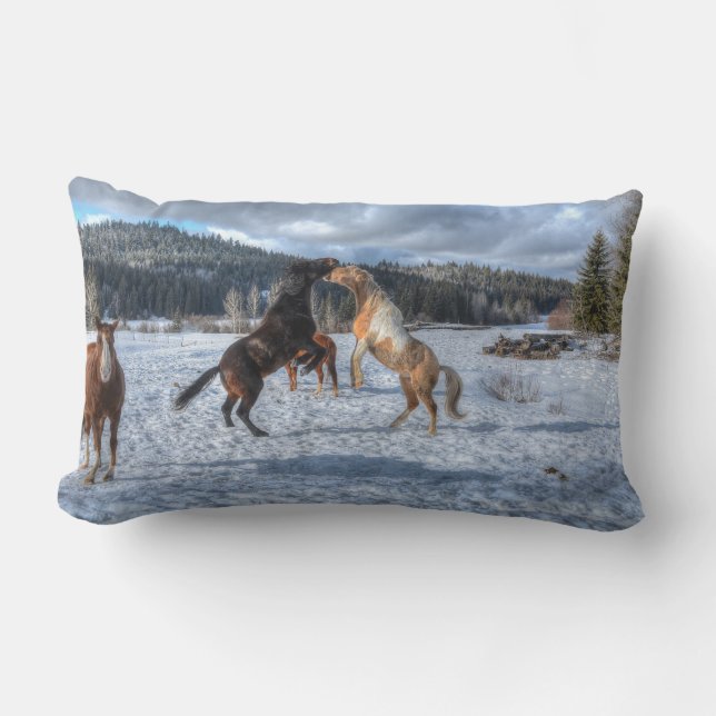 Two Ranch Horses Playfighting in Winter Snow Lumbar Pillow (Front)