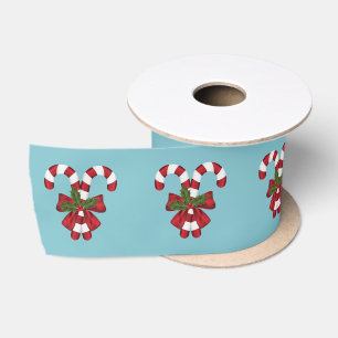 Two Red And White Candy Canes On Blue Satin Ribbon