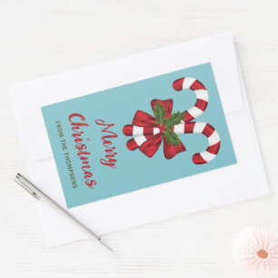 Two Red And White Festive Candy Canes With Text Sticker