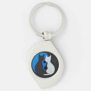 Two stylized cats keychain