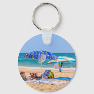 Two sun umbrellas and beach supplies at sea.JPG Keychain