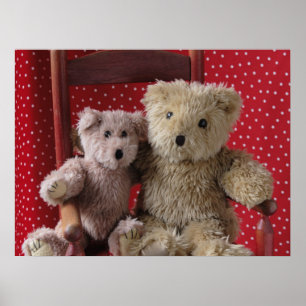 two teddy bears in a red chair poster