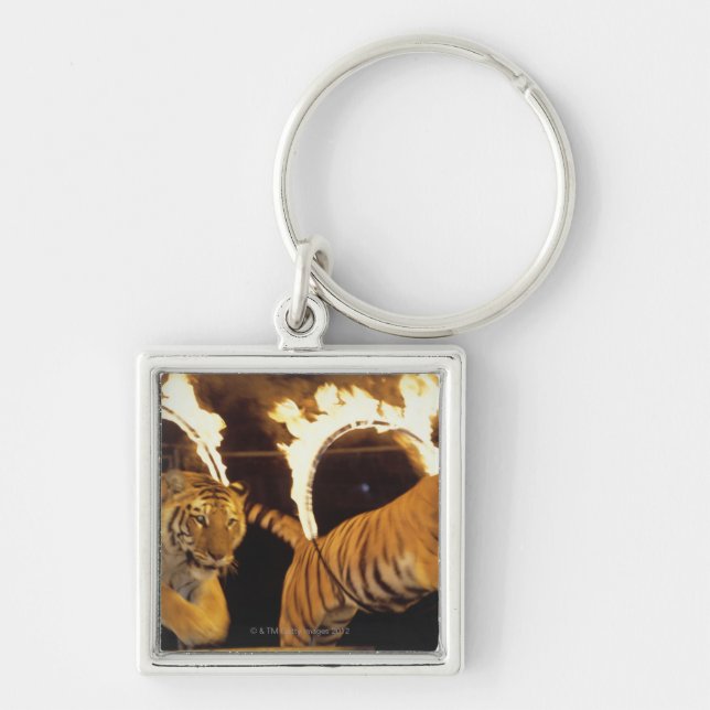 Two tigers leaping through burning rings of fire keychain (Front)