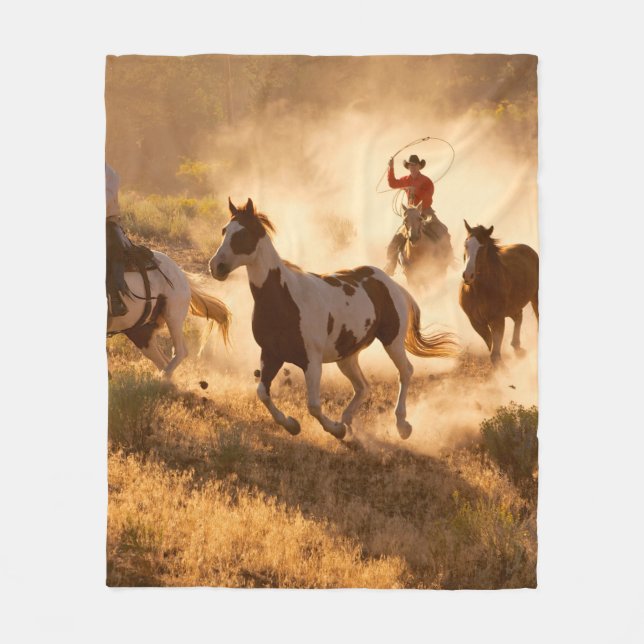 Two western cowboys riding horses, roping wild hor fleece blanket (Front)