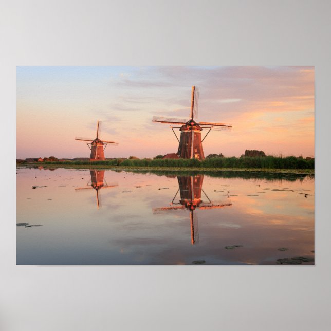 Two windmills with reflection at sunset poster (Front)