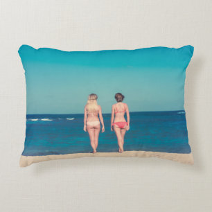 TWO WOMEN WEARING BIKINI STANDING ON SHORE ACCENT PILLOW