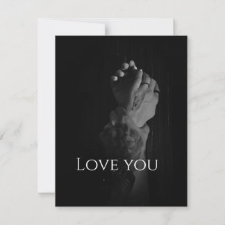 Two Women's Hands Held by a Man's Card