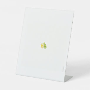 two yellow and green flowers on a white background pedestal sign