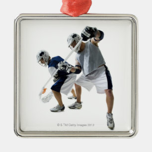 Two young men playing lacrosse metal ornament