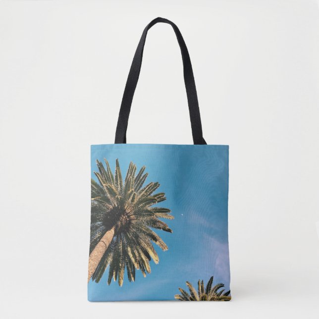 Twp palm trees under blue sky at daytime tote bag (Front)