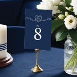 Tying The Knot Rope Heart Nautical Navy & White Table Number<br><div class="desc">Tying the knot? our minimal & elegant navy and white nautical wedding table number is perfect for an ocean themed nautical wedding. The design features our hand-drawn heart-shaped rope knot illustration, with table number designed in a clean, minimal layout. The sharp white and deep navy colours create a modern nautical...</div>
