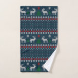 Ugly Sweater Christmas Knitted Pattern Hand Towel<br><div class="desc">This enchanting knit-style towel captures the cozy essence of the holiday season, transforming any space into a warm and inviting Christmas wonderland. With its intricate patterns reminiscent of traditional Nordic designs, the hand towel features charming motifs of snowflakes, reindeer, and evergreen trees designed together in a festive array. The textured...</div>