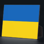 Ukraine Flag Plaque<br><div class="desc">Add a touch of Ukrainian pride to your home or office with our exclusive plaque featuring the flag of Ukraine! Crafted with meticulous attention to detail, this plaque is more than just a decorative item; it’s a celebration of Ukrainian heritage and cultural pride. The vibrant design prominently displays the iconic...</div>