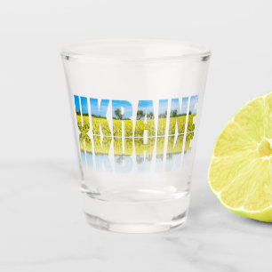 Ukraine label with blue sky and yellow field shot glass