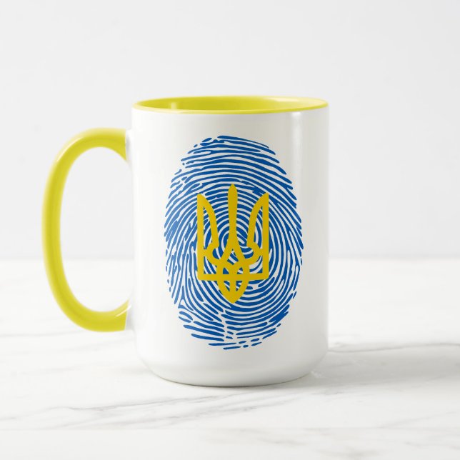 Ukrainian coat of arms on fingerprint background mug (Left)