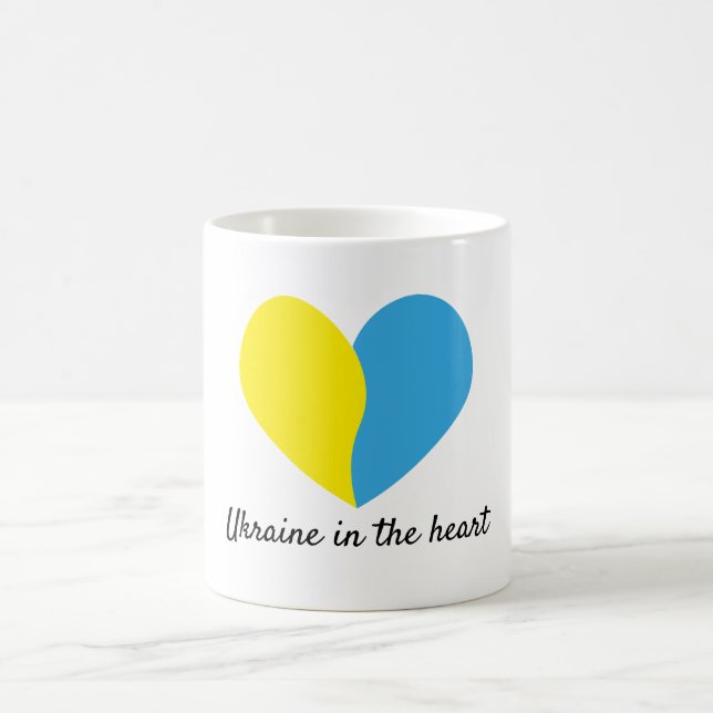 Ukrainian flag on heart simple design magic mug (Center)