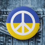 Ukrainian flag peace symbol Ukraine anti war 2 Inch Round Button<br><div class="desc">Ukraine anti war button featuring a white peace symbol on a blue and yellow ukranian flag background.</div>