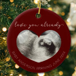 Ultrasound Pregnancy Announcement Keepsake Heart Ceramic Ornament<br><div class="desc">Celebrate the greatest gift this holiday season with our "love you already" ultrasound heart baby announcement ornament! I perfect way to surprise grandparents, siblings, or even new dad! You will remember the joy of new life for years to come with this sentimental keepsake. • Looking for something a little different?...</div>