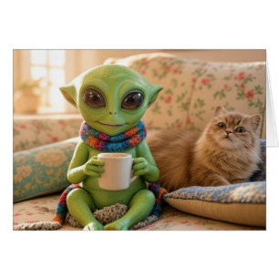 Un adorable café d'alien et de chat sur le canapé