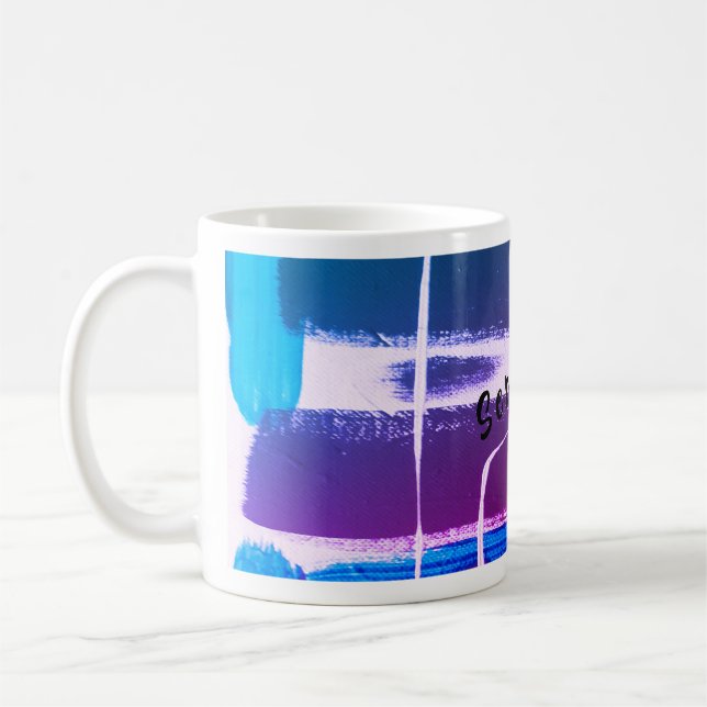 Un design abstrait original sur une tasse blanche  (Gauche)