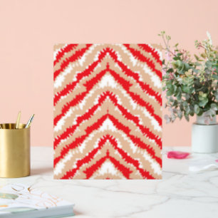 un motif en zigzag rouge et blanc sur fond blanc