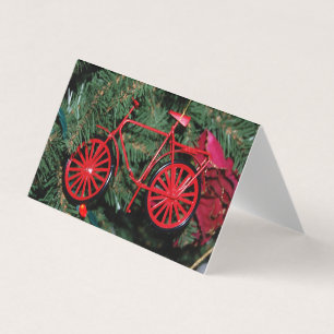 Un ornement à vélo sur un sapin de Noël