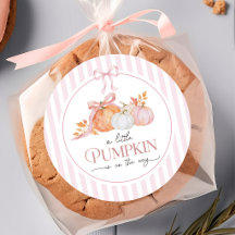 Un petit autocollant de Baby Shower avec un nœud r