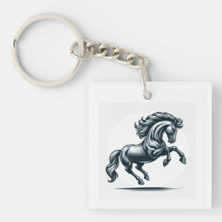 Un porte-clés avec une empreinte de cheval noir