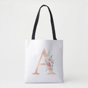 Un sac fourre-tout à motif floral lettre