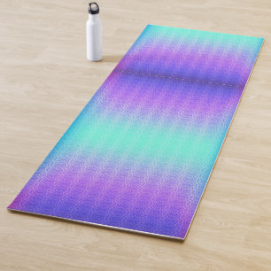 Un tapis de yoga avec un design dégradé