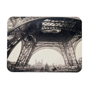 Under the Eiffel Tower, before ascending, from 'L' Magnet
