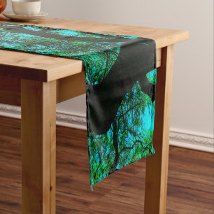 Under the tree in blue and green short table runner