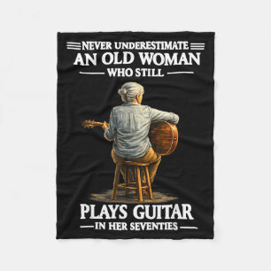Underestimate an old women who plays guitar fleece blanket