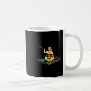 Underestimate woman who kayaks in her seventies coffee mug
